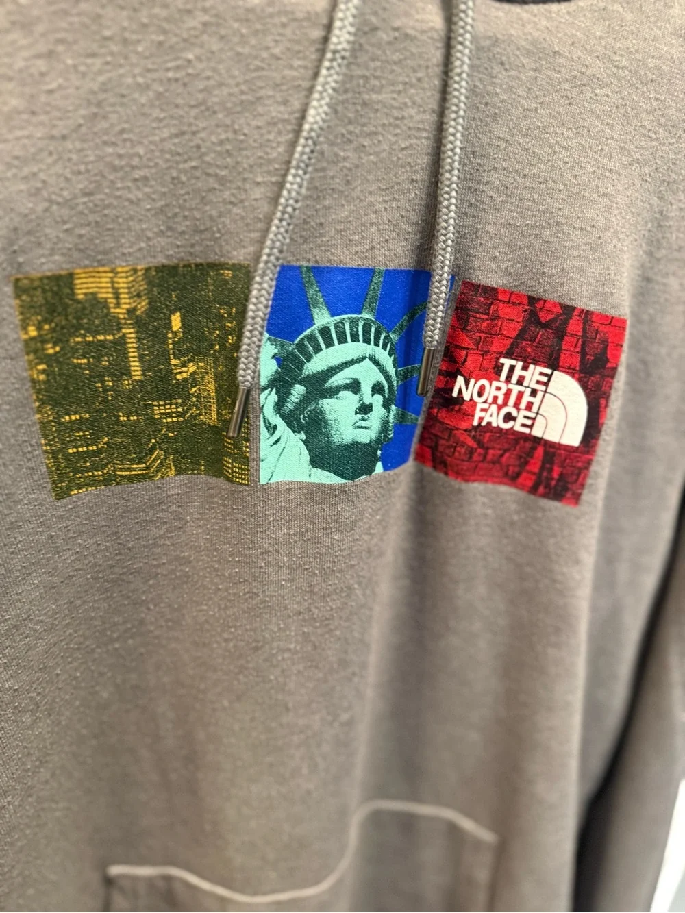 The North Face Men's Gray Pullover Hoodie with Graphic Logo